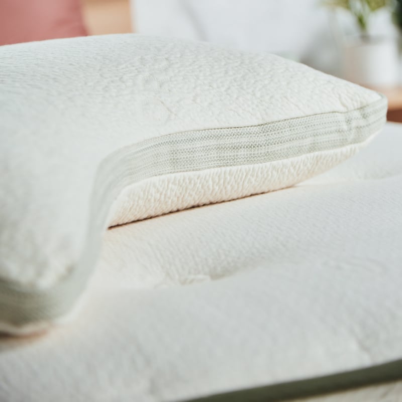 Avocado Side Sleeper Pillow on an Avocado mattress