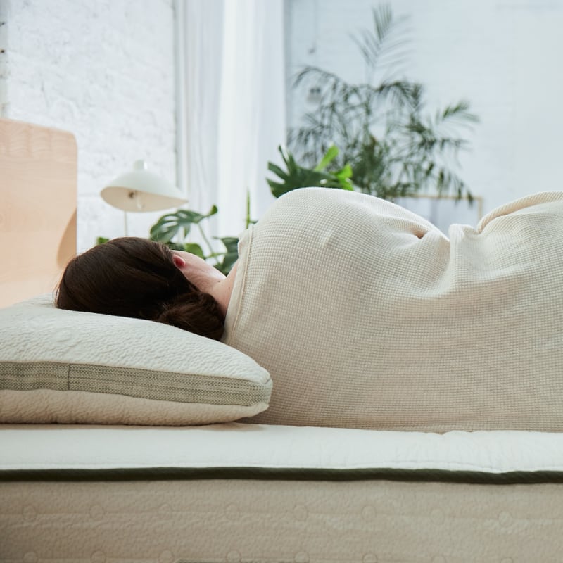 Side sleeping on the Avocado Side Sleeper Pillow