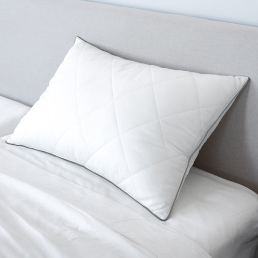 Cariloha Down Feather Pillow on a bed