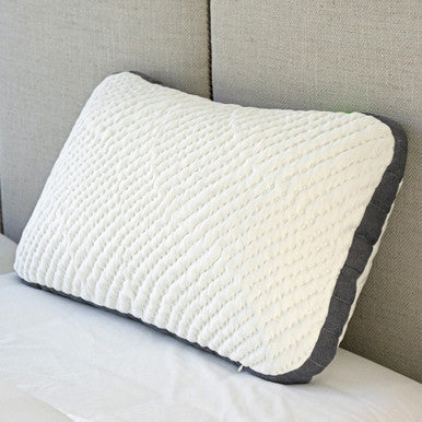Cariloha Flex Pillow on a bed